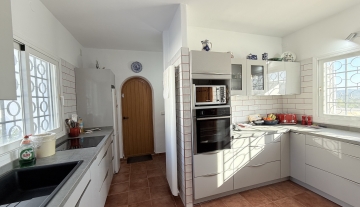 Resa estates ibiza for sale te koop villa huis zwembad san jose kitchen.jpeg
